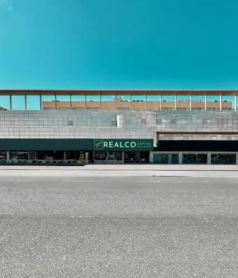 a building with a sign that reads realeccoco at Al Manara Classic Cozy Studio in Dubai