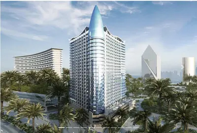 a rendering of a tall building with palm trees at Double Click in Dubai