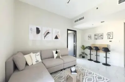 a living room with a couch and a table at B&B retro in Dubai