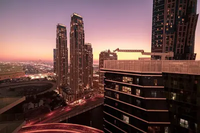 a view of a city with tall skyscrapers at Mahogany 5 - 2BR 6PAX - Infinity Pool & High-floor in Dubai