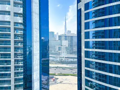 a view of a city with tall buildings at 2BR Apartment in Paramount Tower in Dubai
