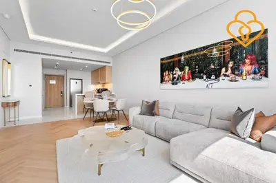 a living room with a couch and a table at Keysplease Upgraded Interiors Luxury Palm Tower 1 BR in Dubai