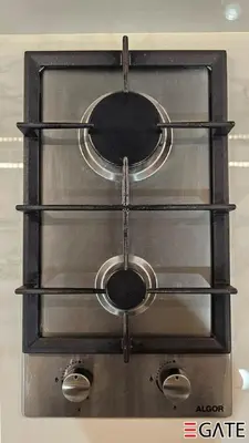 a stove with four glass shelves on it at EGATE - Studio - 1st Floor with Terrace - Dubai - 31-109 in Dubai