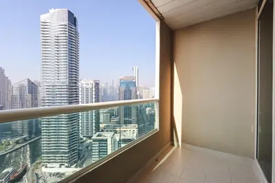 a balcony with a view of a city at Livbnb-Upgraded 3B with Marina View,Near Promenade in Dubai