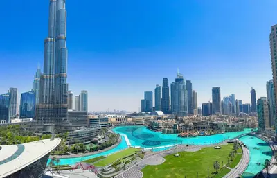 a view of a city with tall buildings at GRANDE SIGNATURE with a direct Burj Khalifa view and Private Fountain Show with DXB AIRPORT VIP Shuttle option for 8 guests in Dubai