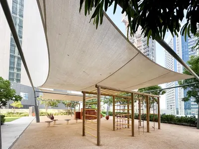a pavilion with awning in a city with tall buildings at Majestic Burj Khalifa View 2BR Premium Apartment By SBH in Dubai