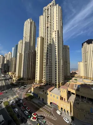a view of a city with tall buildings and cars at New luxury Studio at Prestigious Liv Residence in Dubai