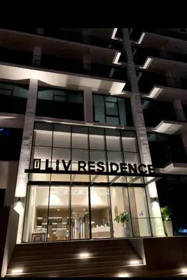 a building with the words livingresistance written on it at New luxury Studio at Prestigious Liv Residence in Dubai