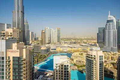 a view of a city with many tall buildings at Arabian Nights 1BR - Burj Khalifa & Fountain Views - 5 Mints Walk to Burj Khalifa and Dubai Mall in Dubai