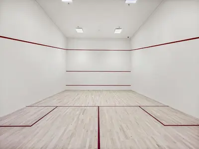 an empty white room with a basketball court at VayK - Luxury 1BR in Downtown in Dubai