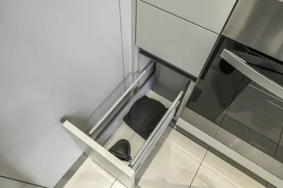 a glass cabinet with a black shoe in it at New 2BR with Pool and Gym in Green Sobha Community in Dubai
