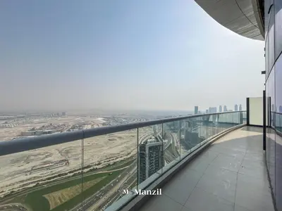 a view of the dubai city from the top of a building at Luxury 1BR Apartment in Paramount Top-Floor Retreat in Dubai