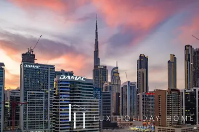 a view of a city skyline with the dubaiaunted at LUX The Modern Binghatti Canal Suite 2 in Dubai