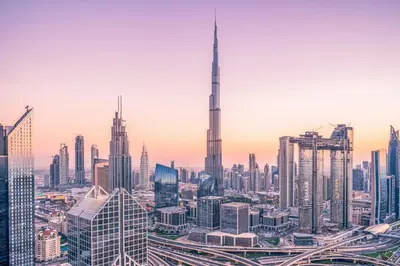 a city skyline with the burj khalifa at Massive LuxXo Family & Friends Villa with Terraces, Private Parking, Pool & Quick Access to Dubai Mall in Dubai