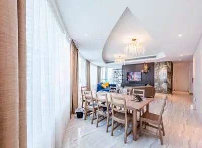 a dining room with a table and chairs at Female - Girls Joyful Journeys - girls only bedspace in Dubai