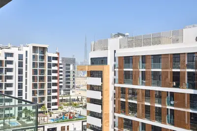 an aerial view of a city with tall buildings at Frank Porter - Azizi Riviera 15 in Dubai