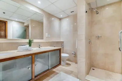 a bathroom with a sink and a shower and a toilet at GuestReady - Contemporary living in Dubai Marina in Dubai