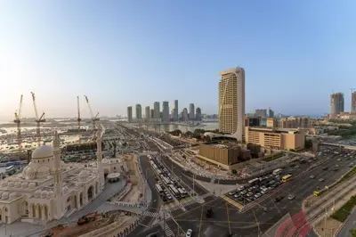 a view of the city of abu dhabi with traffic at Daniels 2BR at Princess Tower with Sea View in Dubai