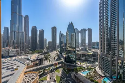 a view of a city with tall buildings at Luxurious Studio with Burj Khalifa View Direct Dubai Mall Access - Kempinski Residence in Dubai