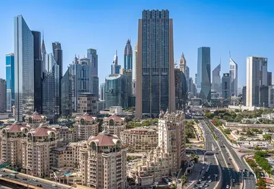 an aerial view of a city with tall buildings at Luxurious Studio with Burj Khalifa View Direct Dubai Mall Access - Kempinski Residence in Dubai