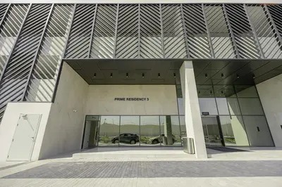 a parking garage with a car inside of it at Bnbeyond's Sassy Studio with Expansive Balcony in Dubai