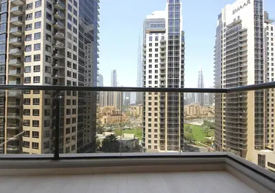 a balcony with a view of a city at Elegant 2BR with City Views Downtown Dubai Living in Dubai