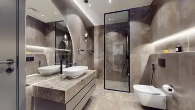 a bathroom with two sinks and a shower at Azure Residence - Magnificent Three Bed in Marina in Dubai