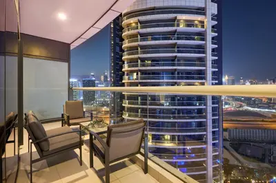 a room with a view of a tall building at Spacious 2 Bedroom Apartment in DAMAC Towers by Paramount Dubai with Pool Gym Free Parking Sleeps 4 by Stayfinity in Dubai