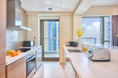 a kitchen with a counter with a toaster on it at Spacious 2 Bedroom Apartment in DAMAC Towers by Paramount Dubai with Pool Gym Free Parking Sleeps 4 by Stayfinity in Dubai