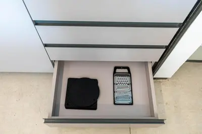 a cell phone in a box in a building at Large 2BR with Work Desk, Pool, Gym and Kids Area in Dubai