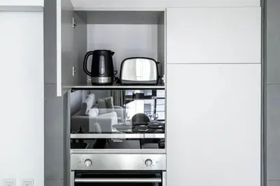 a cupboard with a lot of items in it at New 1BR with Walk-in Wardrobe in Greenish Community in Dubai