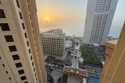 an aerial view of a city with tall buildings at Luxe 2BR Dubai Retreat with Ain Dubai View for 6 guests in Dubai