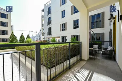 a balcony of a apartment building with a railing at Luxury Escapes - Stylish 2-Bedroom Haven in La Cote, Port de La Mer in Dubai