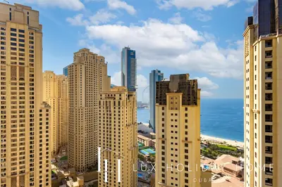a view of a city with tall buildings and the ocean at LUX The Murjan Sea View Suite 2 in Dubai