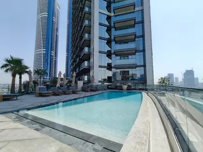 a swimming pool on the roof of a building at CaiCai Homes 1 BHK Nobles Tower Business Bay 5 min Drive to Dubai Mall in Dubai