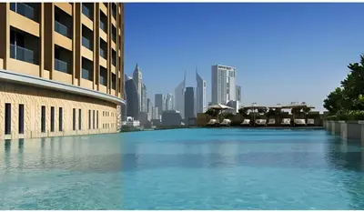 a large body of water in front of a city at Durrani Homes - Dubai Mall Fashion Avenue in Dubai