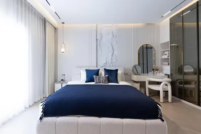 a bedroom with a large bed and a desk at Villa Zalex Springs 14 Luxury Living with Private Pool in Dubai