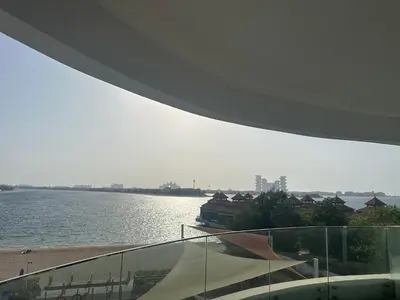 a view of a body of water from a building at Fleur Star Apartments in Dubai
