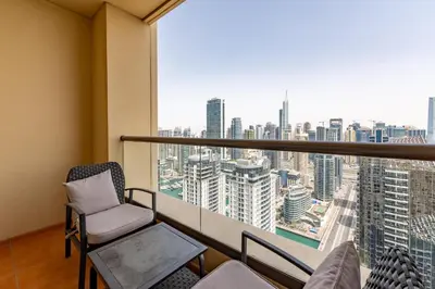 a room with a view of a city at Shams 1, Jumeirah Beach Residence - Mint Stay in Dubai