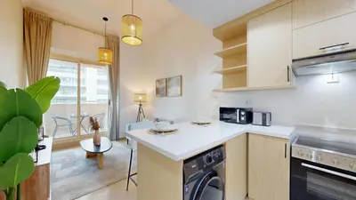 a kitchen with a stove and a dishwasher at Vacationer I Premium 1 Bed I Dubai Marina Living & Metro Nearby I Dream Tower in Dubai