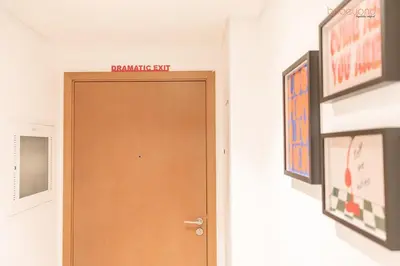 a brown door in a room with a sign on it at Bnbeyond's Artistic Luxe Retreat with Burj Views in Dubai