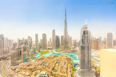 an aerial view of a city with tall buildings at Bnbeyond's Sky-High Luxe with Above and Beyond Views in Dubai