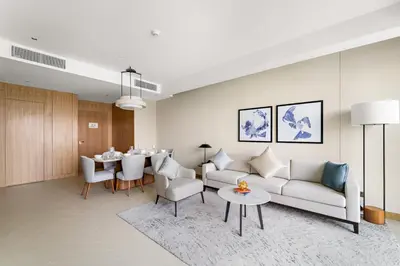 a living room with a couch and a table at Address Residence Dubai Opera 34 by Luxstay Holiday Homes in Dubai
