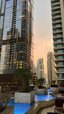 a view of a city with tall buildings at Charming 1BR with Sea & City Views in Dubai