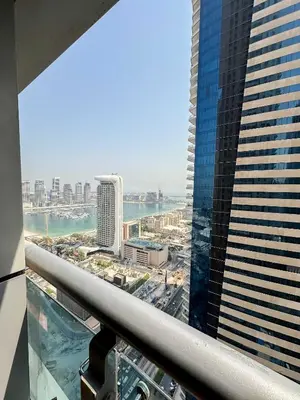 a view of the city from the top of a skyscraper at Charming 1BR with Sea & City Views in Dubai
