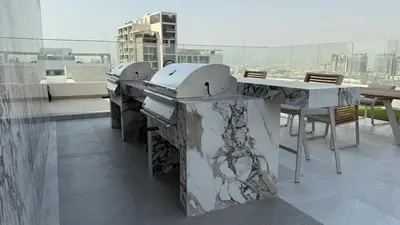 a kitchen on the roof of a building at Brand new fully furnished studio in Dubai