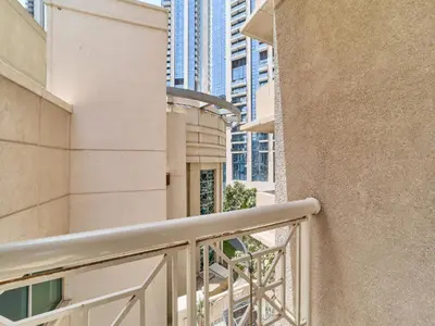 a balcony of a building with buildings in the background at Golden Homes 29 blvd tower Urban nest 1BR Near Dubai mall & burj khalifa downtown dubai in Dubai