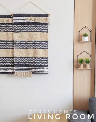 a living room with a striped rug hanging on a wall at Modern Luxury Fully Furnished 1BH Apartment in Binghatti Luna JVC - Easy Access to JBR, Circle Mall & Dubai Hills Mall in Dubai