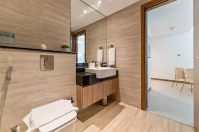 a bathroom with a sink and a mirror at Upscale 1BR Luxury Apt in Business Bay in Dubai