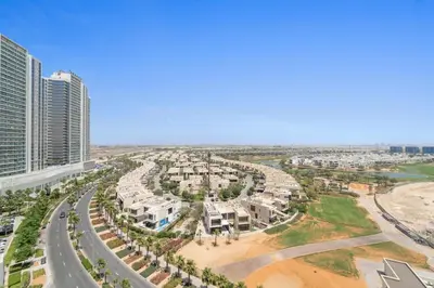 an aerial view of a city with tall buildings at Modern 1BR at Golf Vita A in Damac Hills Near Golf in Dubai
